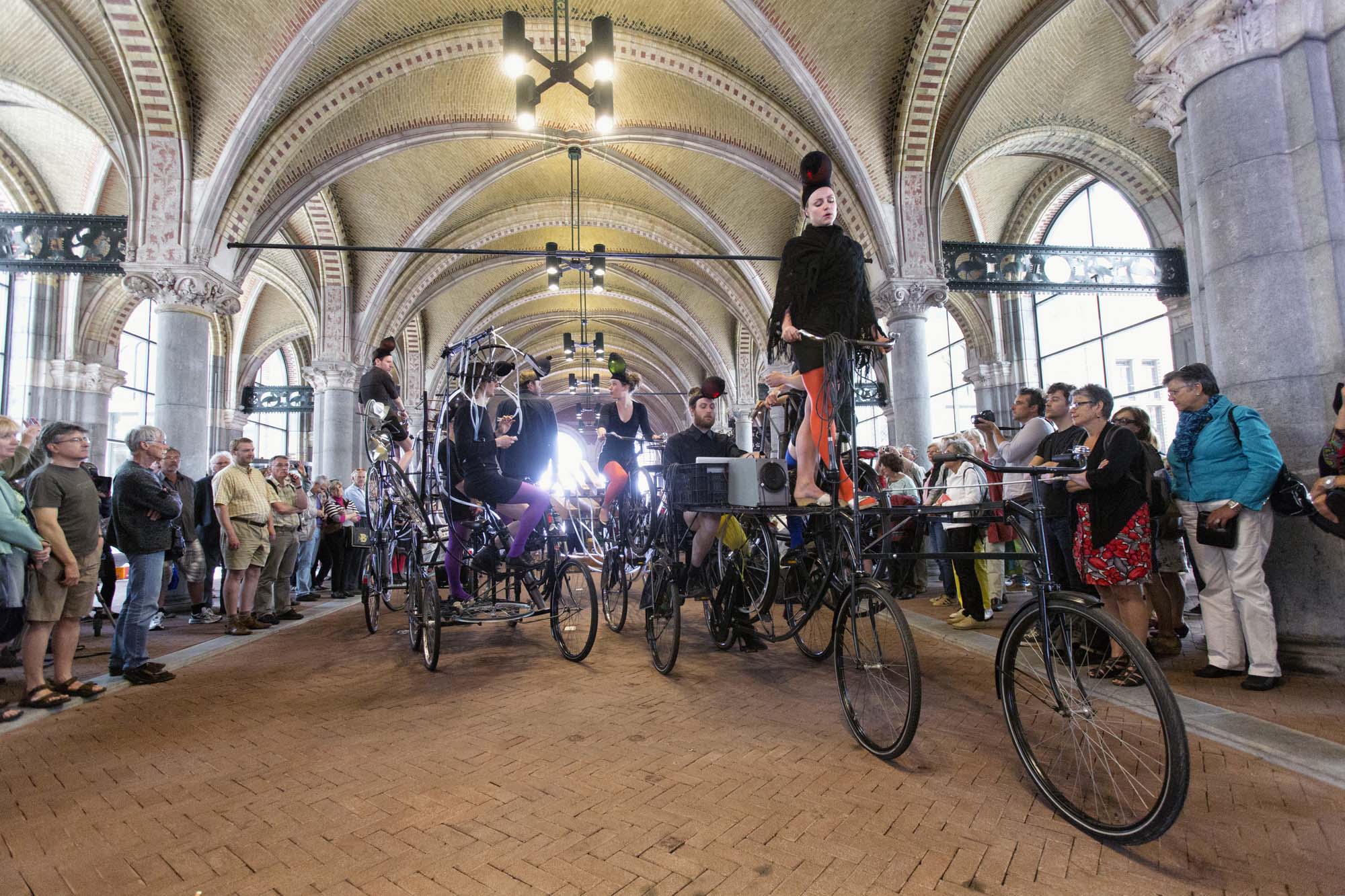 Music Theater Cyclophonia with two giant self-riding bikes under the Rijksmuseum passage Amsterdam